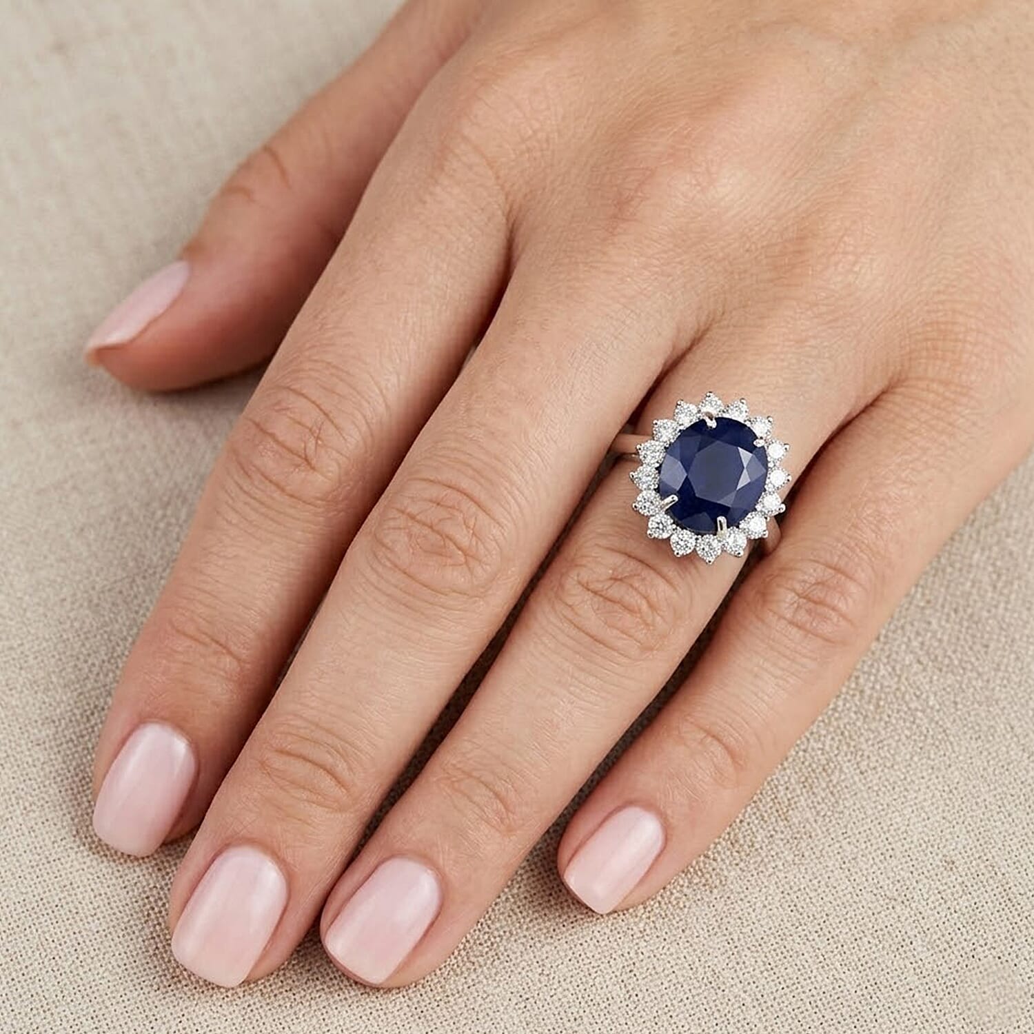 Luxuriant - Blue Sapphire (Oval 12x10 mm, 7.10Cts) & Lab Grown Diamond (SI-G-H, 1.00Cts) Halo Ring in Rhodium Overlay Sterling Silver 8.10 Ct.