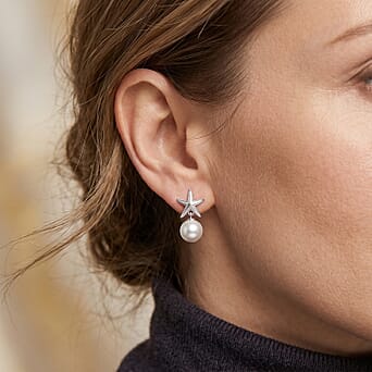 https://tjcuk.sirv.com/Products/86/1/8618142/D-Joy-Premium-White-Edison-Pearl-10-11mm-Stud-Ball-Earring-with-Push-B_8618142_1.jpg?w=342&h=342