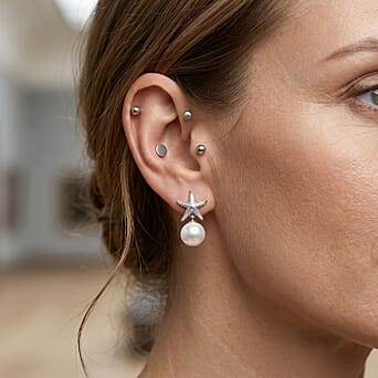 https://tjcuk.sirv.com/Products/86/1/8618142/D-Joy-Premium-White-Edison-Pearl-10-11mm-Stud-Ball-Earring-with-Push-B_8618142_2.jpg?w=342&h=342
