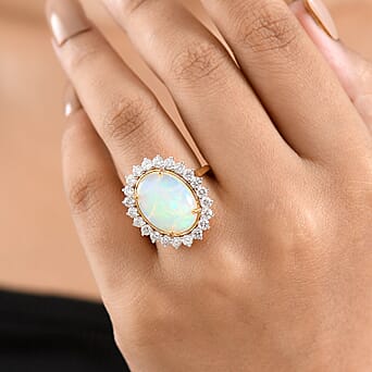 https://tjcuk.sirv.com/Products/86/2/8625015/Luxuriant-Ethiopian-Opal-Lab-Grown-Diamond-Main-Stone-With-Side-Stone-_8625015_1.jpg?w=342&h=342