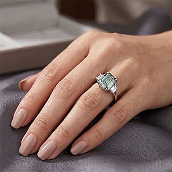 https://tjcuk.sirv.com/Products/86/3/8634700/D-Joy-Paraiba-Moissanite-Trilogy-Ring-in-Rhodium-Overlay-Sterling-Silv_8634700_1.jpg?w=342&h=342