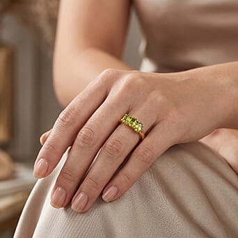 https://tjcuk.sirv.com/Products/86/6/8662586/D-Joy-Natural-Hebei-Peridot-Trilogy-Ring-in-Yellow-Gold-Plated-Sterlin_8662586_1.jpg?w=342&h=342
