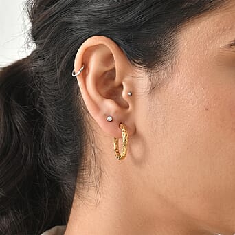 https://tjcuk.sirv.com/Products/86/6/8662596/EverTrue-Bronzella-Collection-Huggie-Earring-with-Clasp-Back-in-Yellow_8662596_2.jpg?w=342&h=342