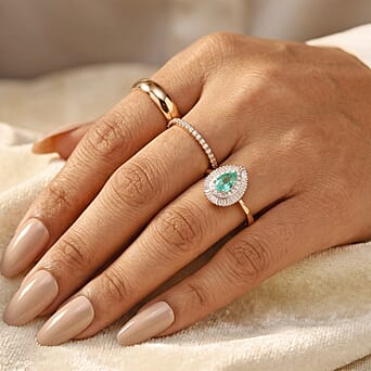 https://tjcuk.sirv.com/Products/86/6/8664517/9K-Yellow-Gold-AAA-Colombian-Emerald-Natural-White-Diamond-Halo-Ring-1_8664517_2.jpg?w=342&h=342