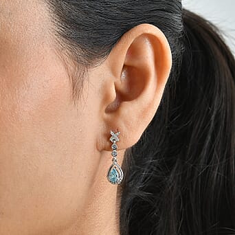 https://tjcuk.sirv.com/Products/86/7/8676606/D-Joy-Blue-Zircon-White-Zircon-Dangling-Earring-in-Rhodium-OverlaySter_8676606_1.jpg?w=342&h=342