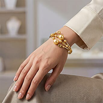 https://tjcuk.sirv.com/Products/86/7/8677134/Golden-Shell-Pearl-Crystal-Bangle-50-000-Ct_8677134_1.jpg?w=342&h=342