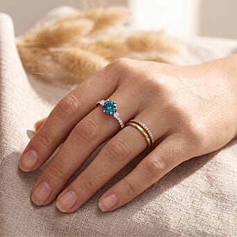 https://tjcuk.sirv.com/Products/87/0/8706756/Luxuriant-Blue-Zircon-Lab-Grown-Diamond-Ring-in-Rhodium-OverlaySterlin_8706756_2.jpg?w=342&h=342