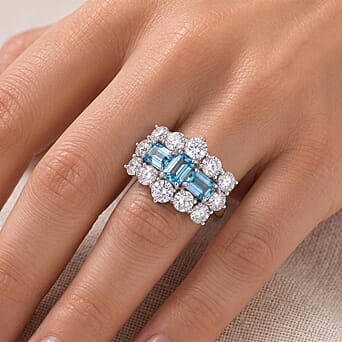 https://tjcuk.sirv.com/Products/87/0/8706765/D-Joy-Blue-Zircon-Moissanite-Ring-in-Rhodium-OverlaySterling-Silver-5-_8706765_1.jpg?w=342&h=342
