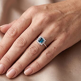 https://tjcuk.sirv.com/Products/87/0/8706774/Luxuriant-Blue-Zircon-Lab-Grown-Diamond-Ring-in-Rhodium-OverlaySterlin_8706774_1.jpg?w=342&h=342