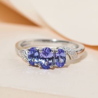 https://tjcuk.sirv.com/Products/87/2/8726015/Tanzanite-Trilogy-Ring-in-Platinum-Overlay-Sterling-Silver_8726015_1.jpg?w=342&h=342