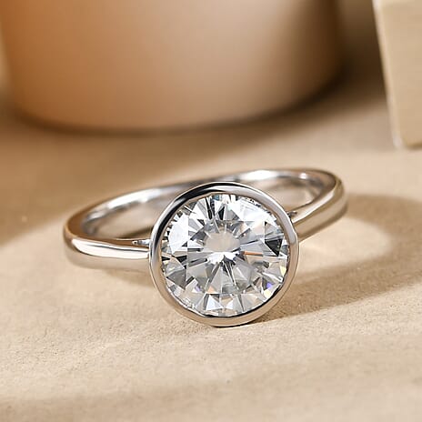 Moissanite Solitaire Ring in Platinum Overlay Sterling Silver.