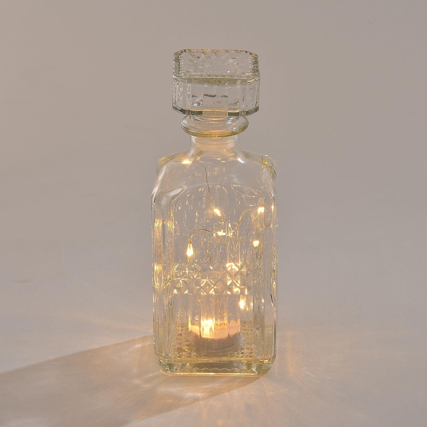 Embossed Square Glass Bottle with 18 Mini LED String Lights (Size 9x9x23 Cm)