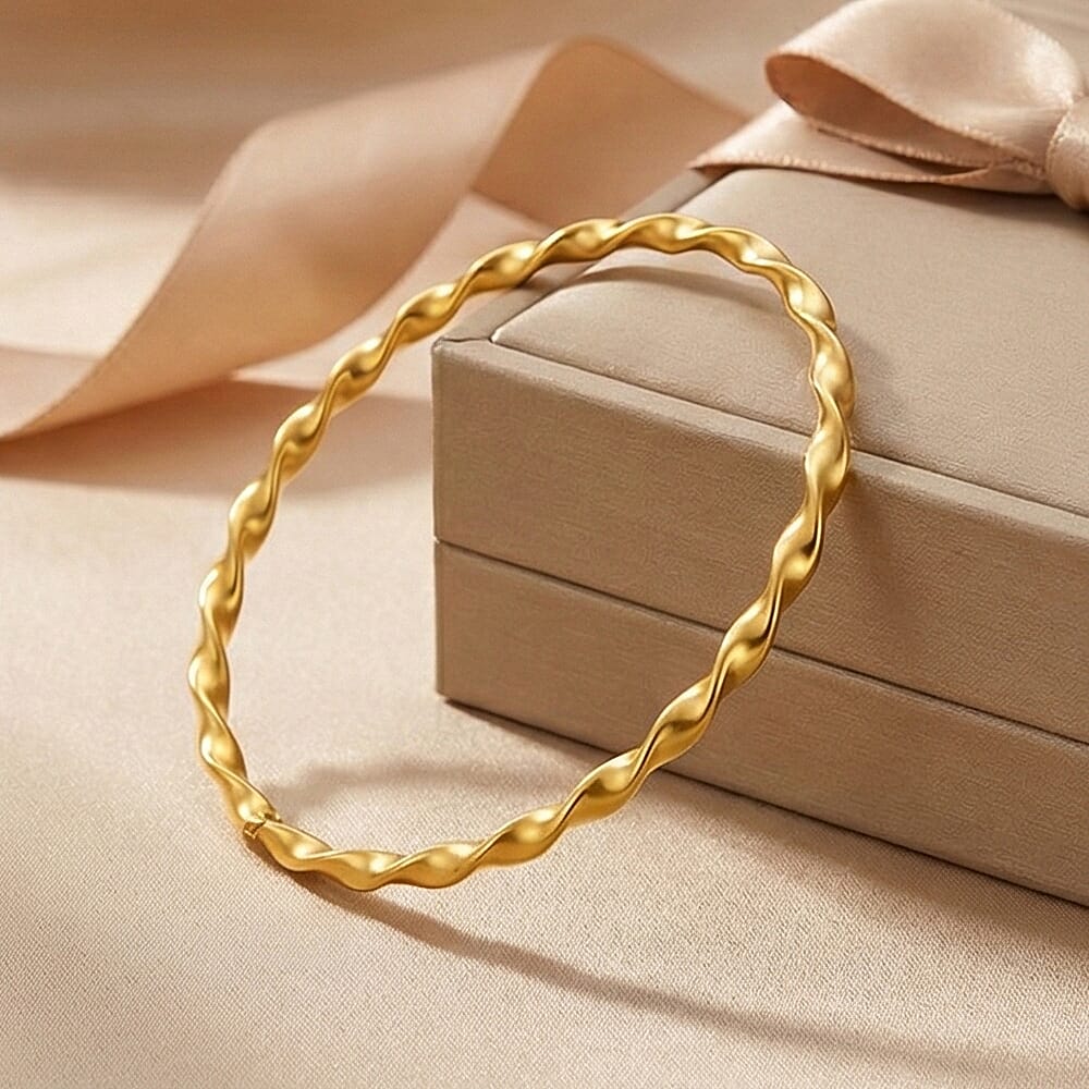 9K Yellow Gold Supreme Finish 8mm Round Twist Bangle