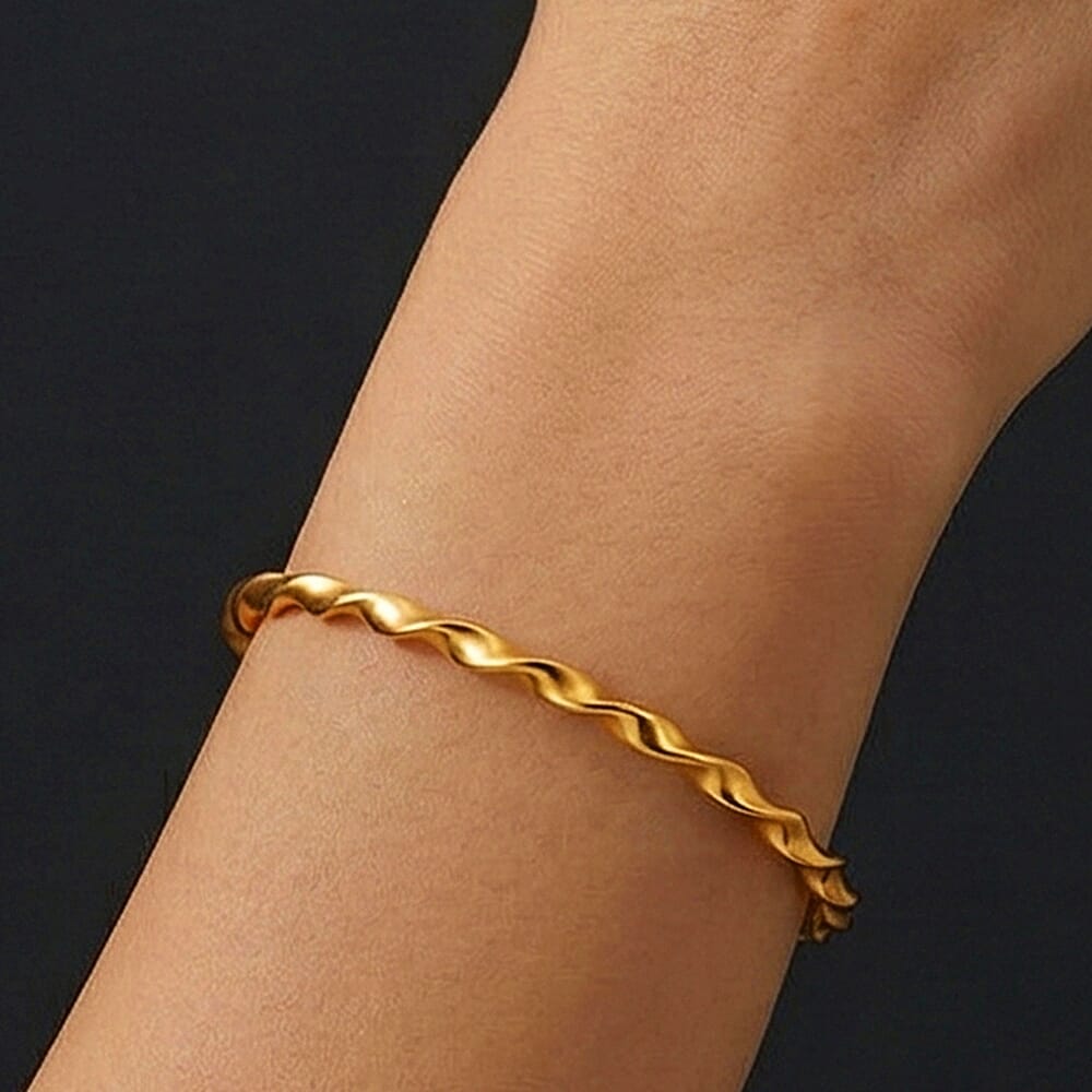 9K Yellow Gold Supreme Finish 8mm Round Twist Bangle