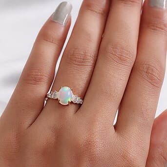 https://tjcuk.sirv.com/Products/88/9/8897404/AAA-Ethiopian-Welo-Opal-(1.25-Cts)-and-Diamond-0.25-Cts)-Ring-in-Gold-_8897404_2.jpg?w=342&h=342