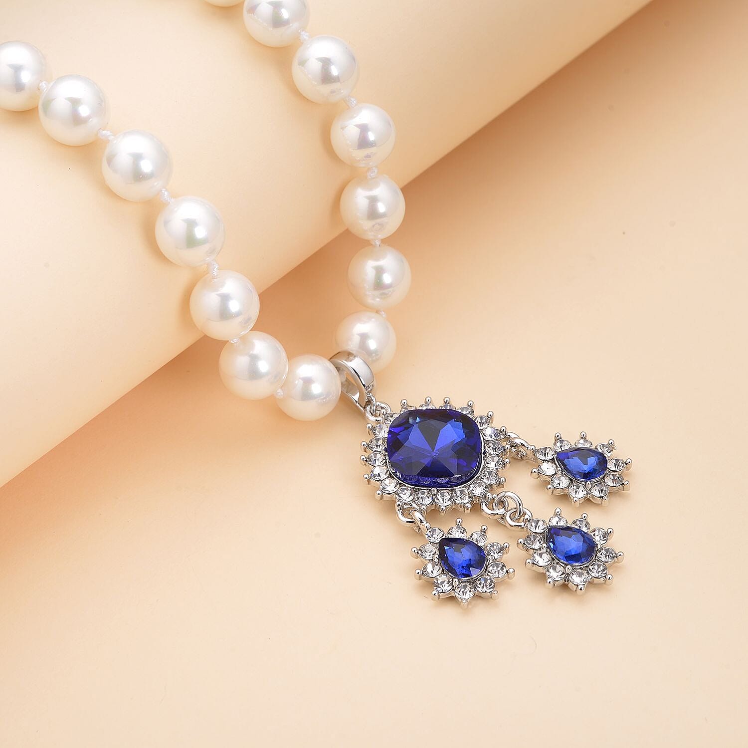 Victorian Era Inspired Simulated Tanzanite and White Austrian Crystal Pendant in Silver Tone