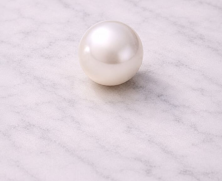 Cultured pearl on marble