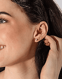 Laura wearing the diamond studs