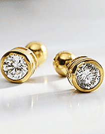 Michelle B. wearing the diamond studs